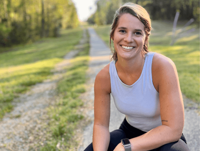 Hannah Cochran smiling on a trail